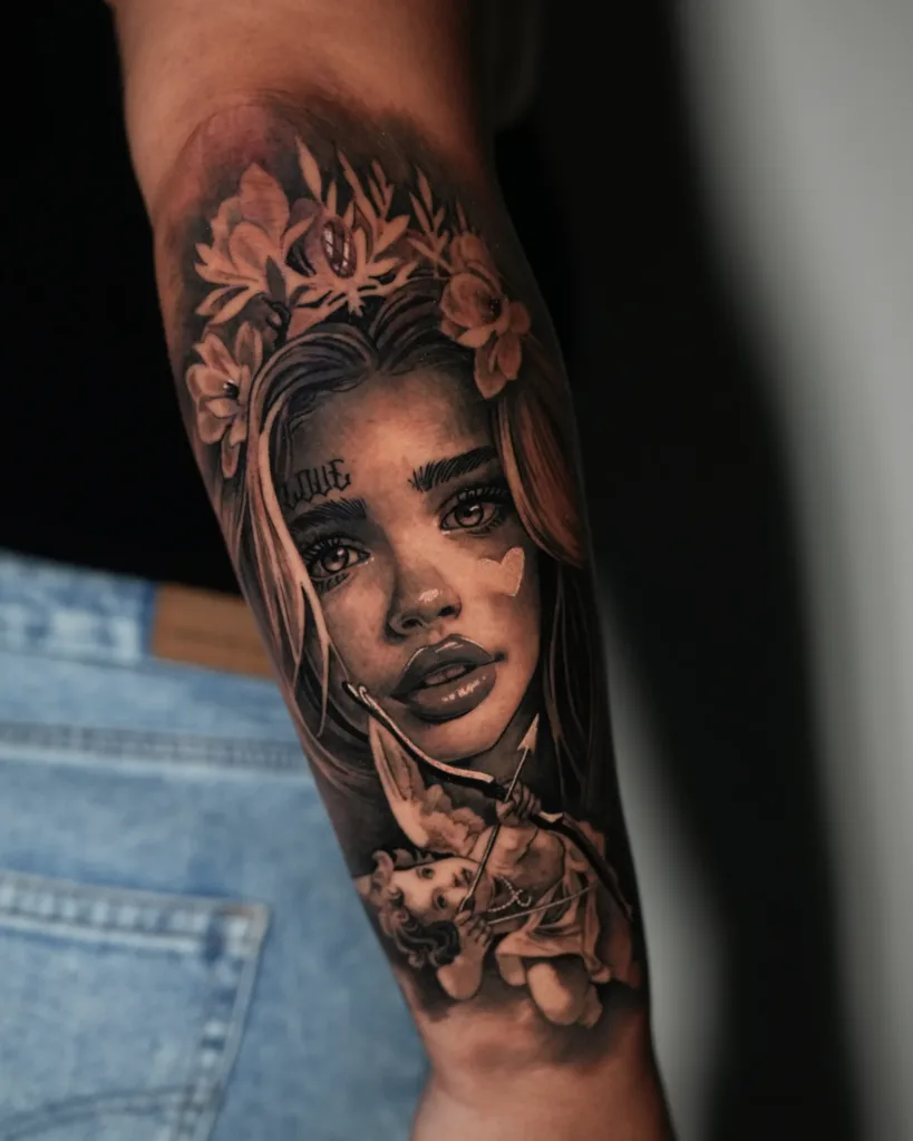 an image a woman with cupid tattooed on a man's arm showcasing black and grey tattoo in Miami, FL