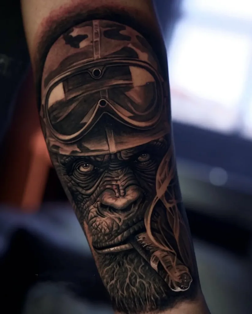an image of a gorilla smoking a cigar tattooed on a man's arm showcasing expert tattoo shops in Tampa, FL