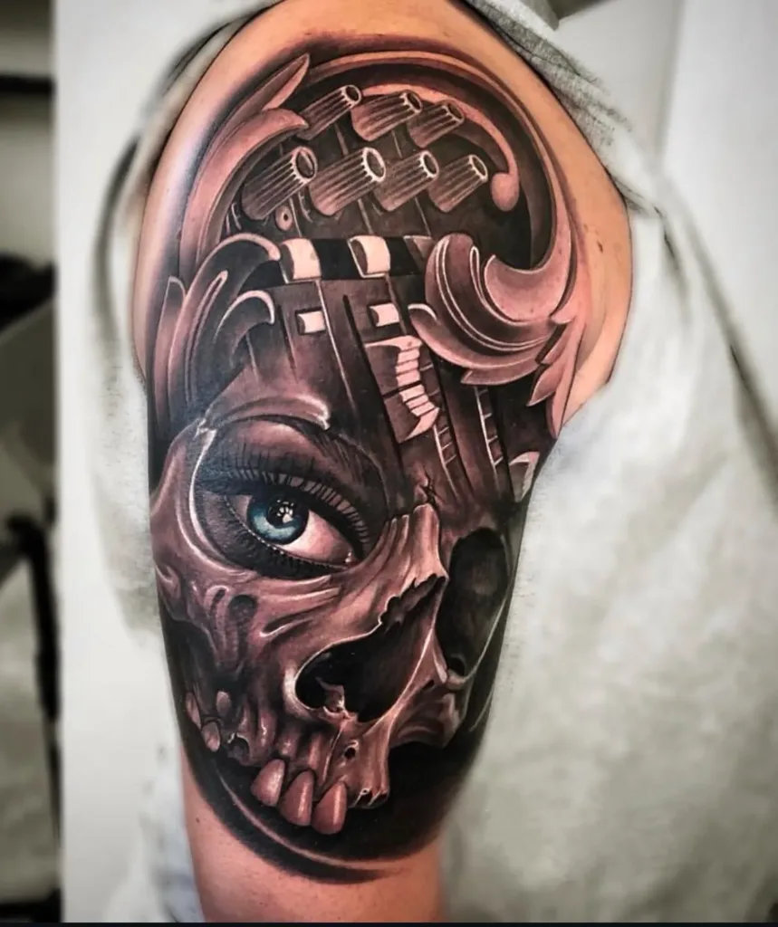 an image of a skull with blue eyes tattooed on a man's arm showcasing black and grey tattoo in Miami, FL